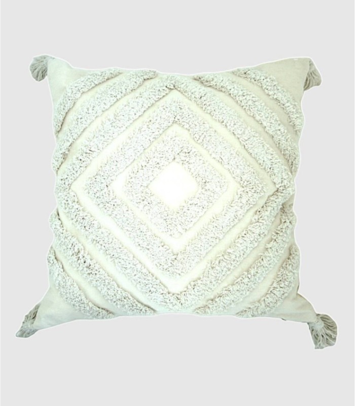 White cushion with diamond pattern and square pompom
