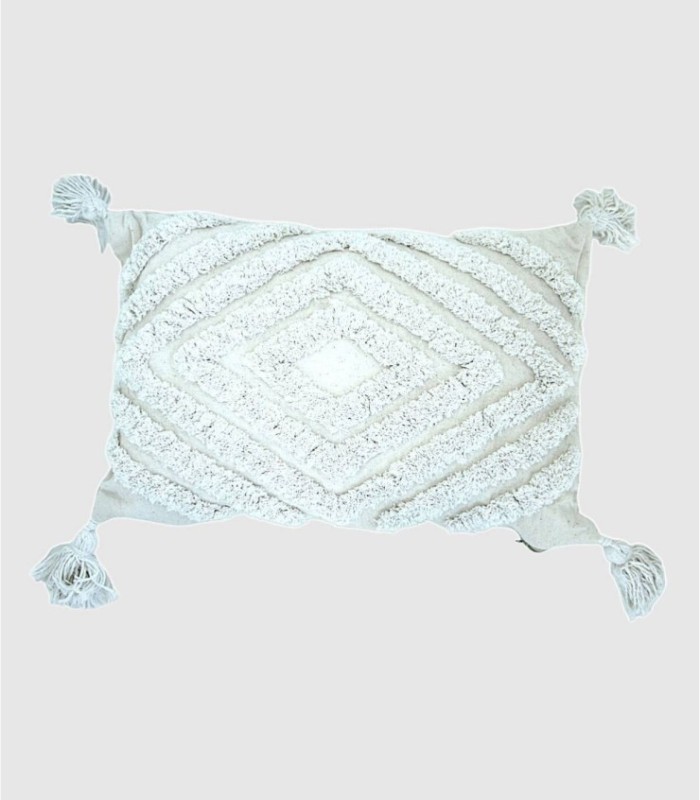 White rectangular cushion with diamond pattern and pom-pom