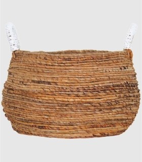Large round rustic wicker basket with white handles