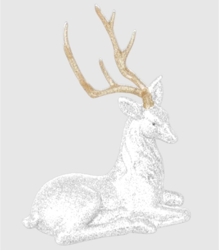 Reno blanco dorado sentado