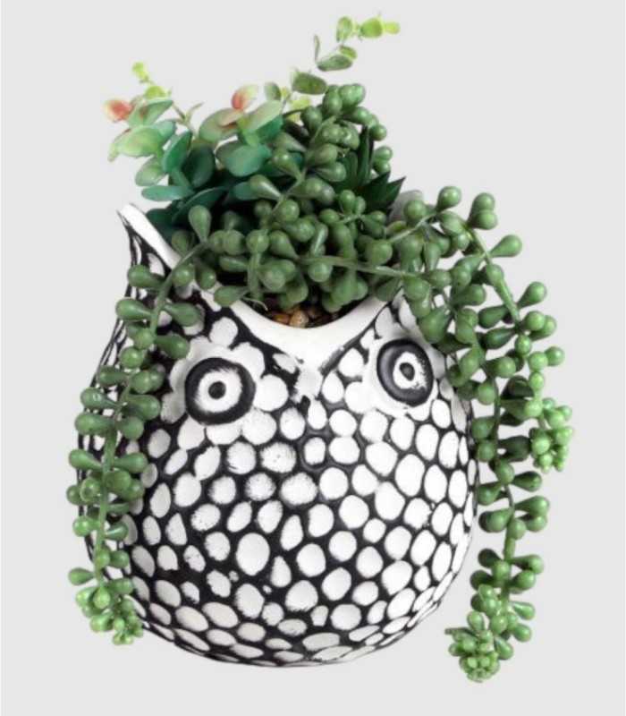 Maceta con planta artificial