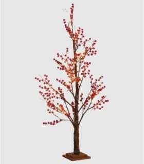 Árbol bayas rojas con luz